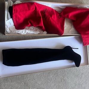 Christian Louboutin black velvet thigh high boots!
Size 39.5